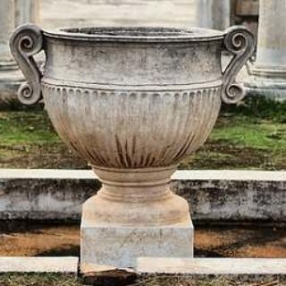 The vase-like structure made of original marble in the middle of the courtyard