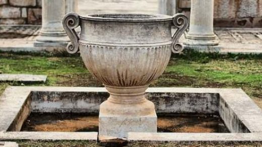 The vase-like structure made of original marble in the middle of the courtyard
