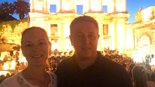 Hasan and Valeriya Gülday in front of Celsus Library of Ephesus during a Night Tour in Ephesus